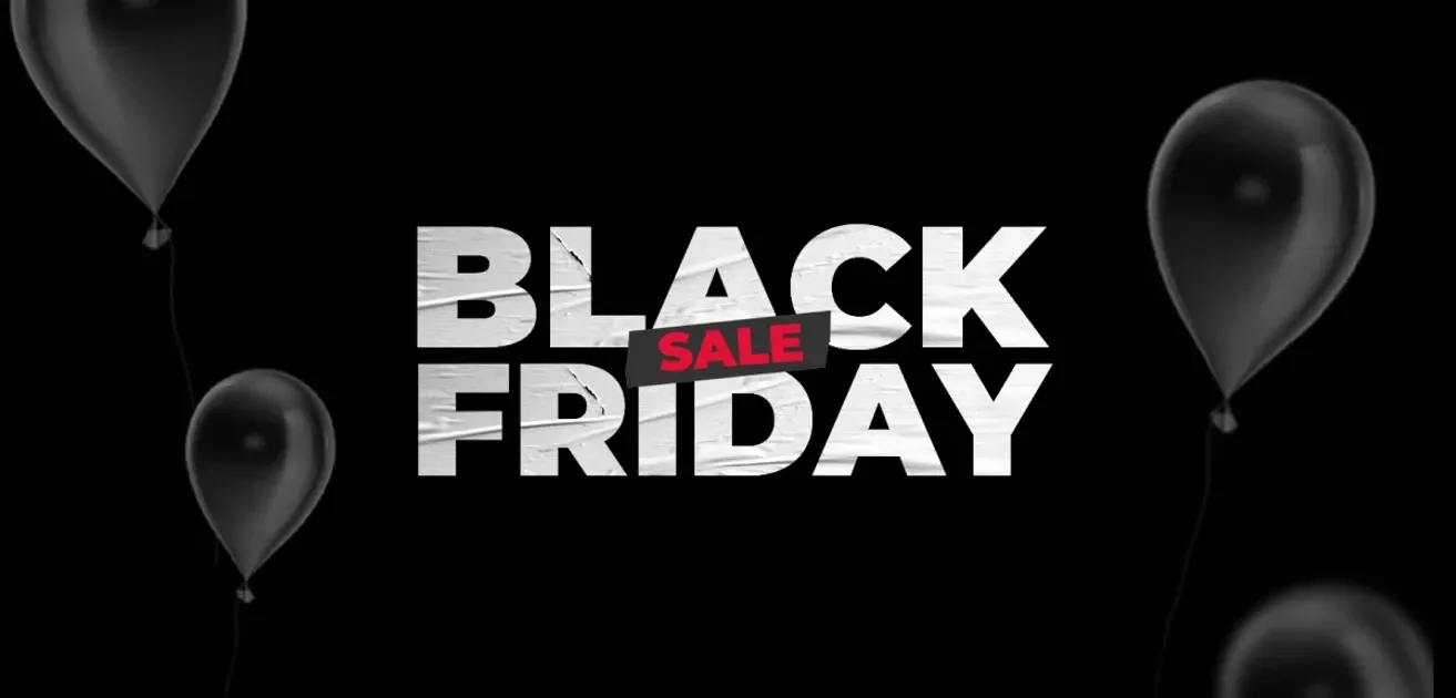 Black Friday sale lettering in white with a red Sale tag on a black background with black balloons